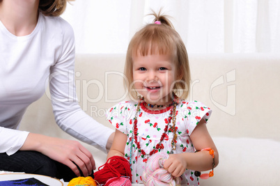 Young mother and her baby daughter