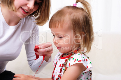 Young mother and her baby daughter