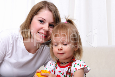 Young mother and her baby daughter