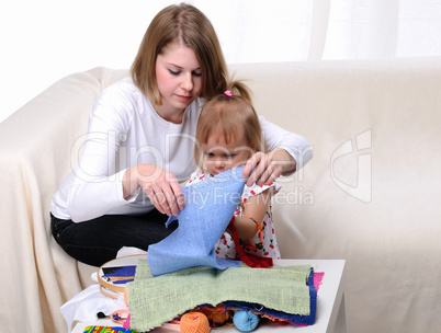 Young mother and her baby daughter