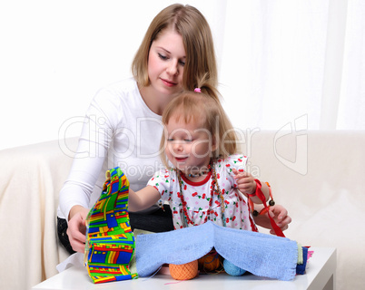 Young mother and her baby daughter