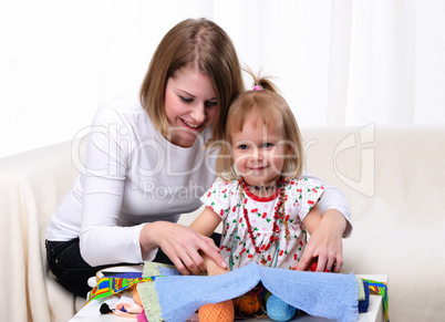 Young mother and her baby daughter