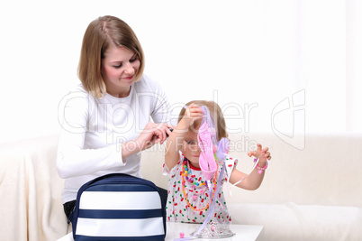 Young mother and her baby daughter