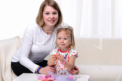 Young mother and her baby daughter