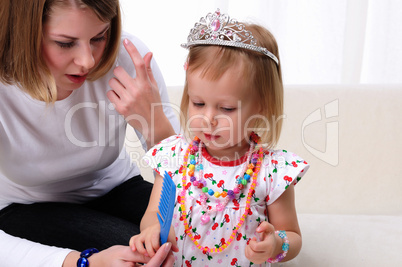 Young mother and her baby daughter