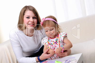 Mama and her little daughter