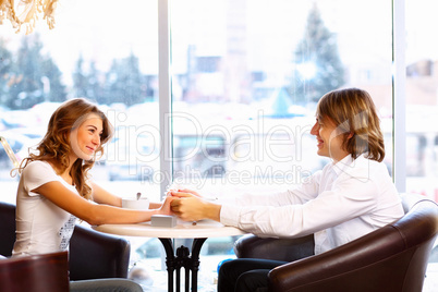 Young couple having a date in restaurant