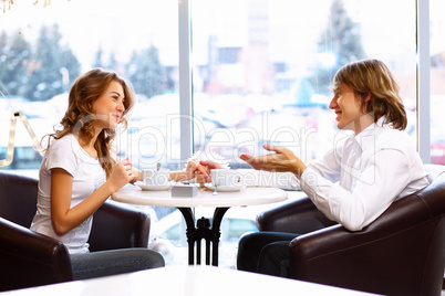 Young couple having a date in restaurant