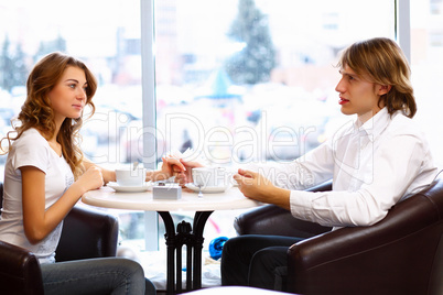 Young couple having a date in restaurant