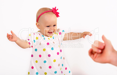 Little blond girl in studio