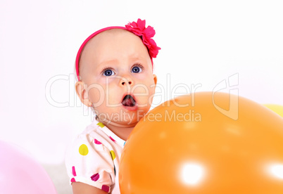 Little blond girl in studio