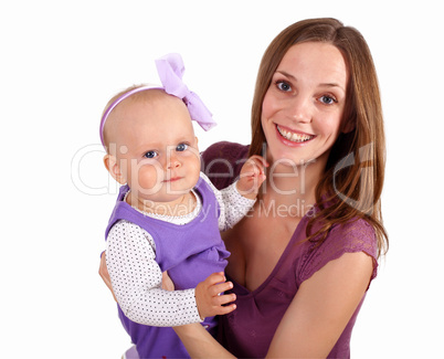 Young mother with little daughter