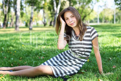 Young woman in summer park