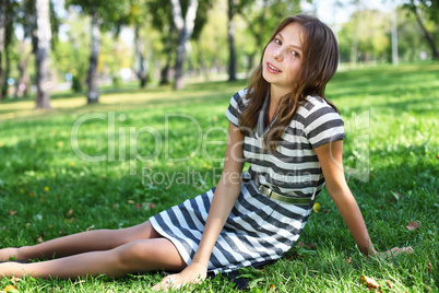 Young woman in summer park