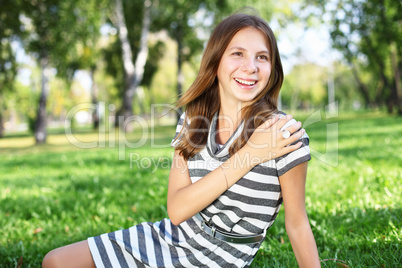 Young woman in summer park