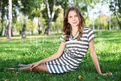 Young woman in summer park