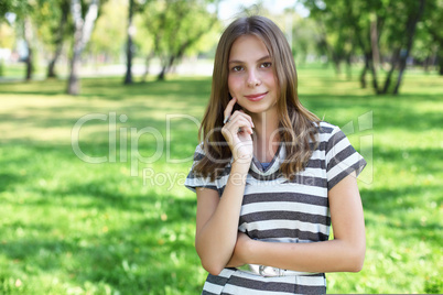 Young woman in summer park