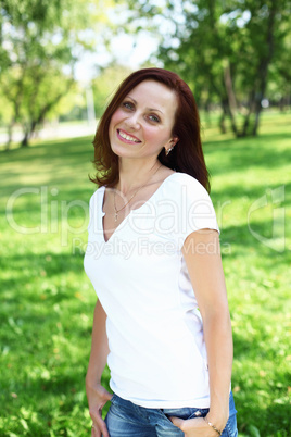 Young woman in summer park