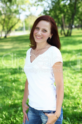 Young woman in summer park