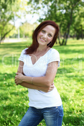 Young woman in summer park