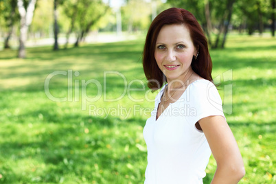 Young woman in summer park