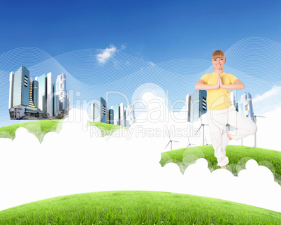 Young woman doing yoga against blue sky