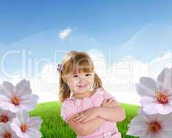 Smiling girl on green grass