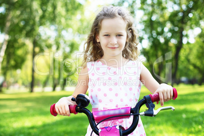 Little girl in summer park