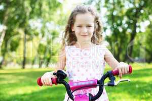 Little girl in summer park