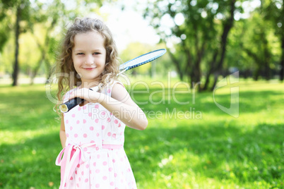 Little girl in summer park