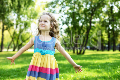 Little girl in summer park