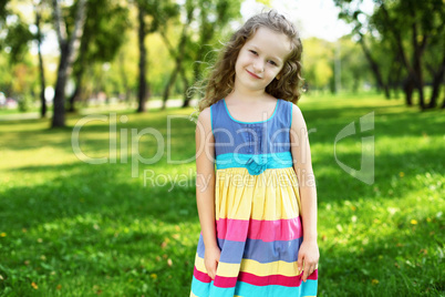 Little girl in summer park