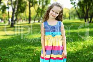 Little girl in summer park