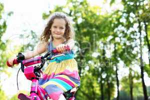 Little girl in summer park