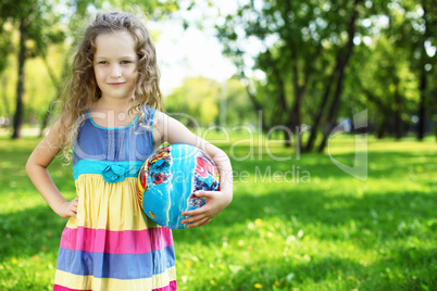 Little girl in summer park