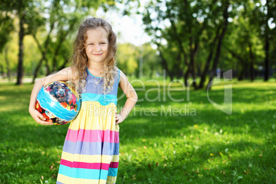 Little girl in summer park