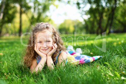 Little girl in summer park