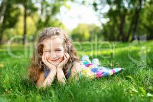 Little girl in summer park