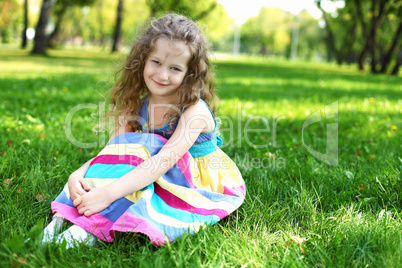 Little girl in summer park