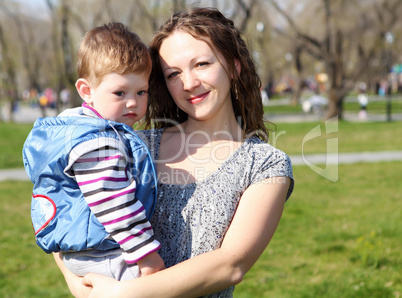 litlle boy with mother in the park