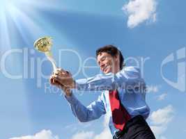 young businessman  with a golden cup