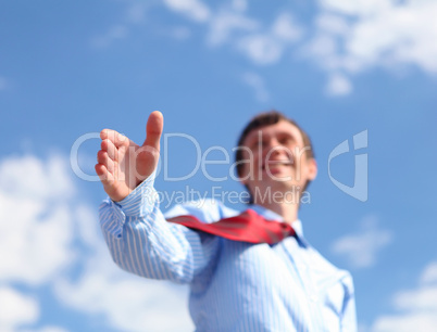 young businessman in a blue shirt and red tie