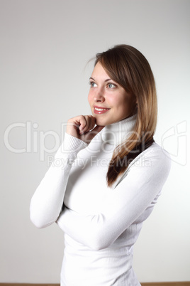 Young girl in white sweater