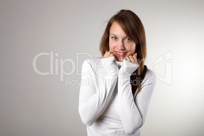 Young girl in white sweater