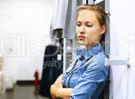 Woman in a shop buying clothes