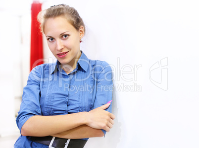 Woman in a shop buying clothes