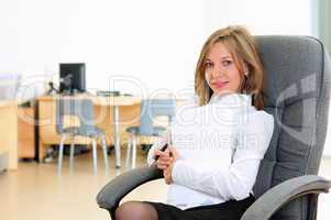 young girl in his office