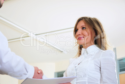 young girl shakes hands