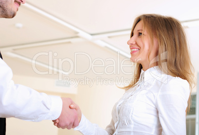 young girl shakes hands