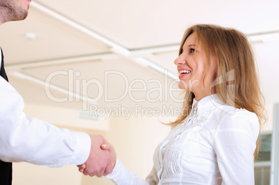 young girl shakes hands